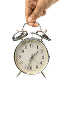 Desk clocks in hand on white background,clipping - path.