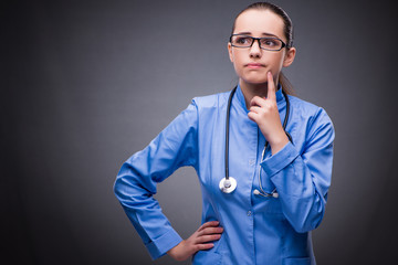 Fototapeta premium Young doctor in medical concept