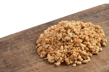 Quick and tasty breakfast of granola on a wooden board