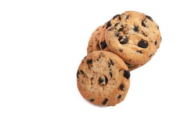 delicious cookies with chocolate stacked in a pile and photographed from above on a white background