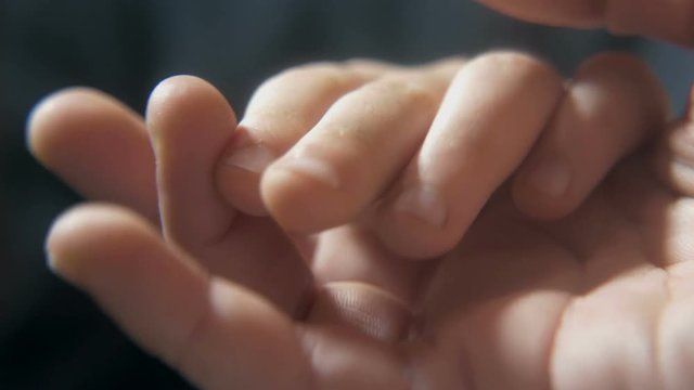  hand of father and son, close-up