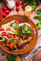 Chicken wings tomato sauce green beans rice