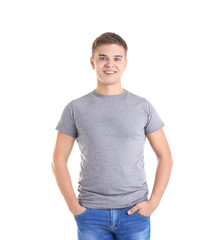 Handsome young man in blank grey t-shirt on white background