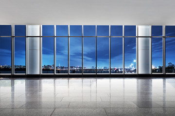 cityscape and skyline of modern city at twilight from empty office