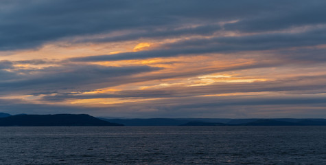Fototapeta na wymiar Beautiful sunset with clouds and sea.