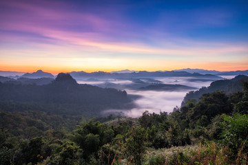 Fototapeta na wymiar Viewpoint mist mountain colorful at dawn