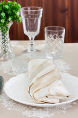Beautiful holiday table setting in white color