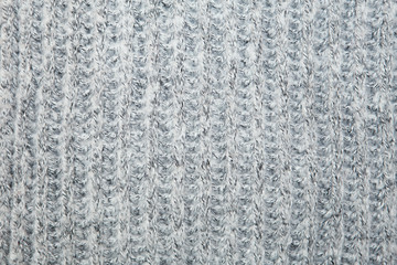 Close up on knit woolen fur texture.