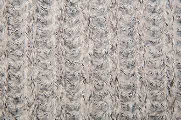 Close up on knit woolen fur texture.