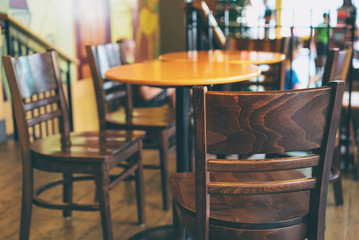 Wooden chairs in cafeteria.