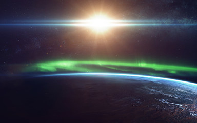 Natural phenomenon of Northern Lights (Aurora Borealis) related to the earth's magnetic field. Elements of this image furnished by NASA