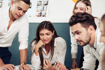 Team of architects working on construction plans