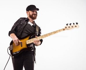 Obraz premium Bassist plays bass guitar.