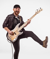 Obraz premium Bassist plays bass guitar.