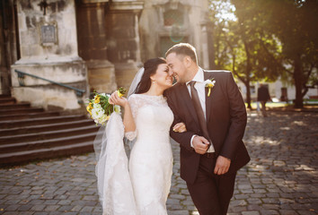 Charming bride with her handsome groom
