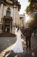 Bride in the amazing dress with the groom