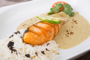 Fish fillet served with rice