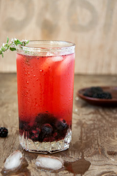 Blueberry and blackberry lemonade with mint decoration