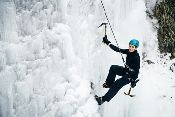 women climbed a frozen waterfall, icicle