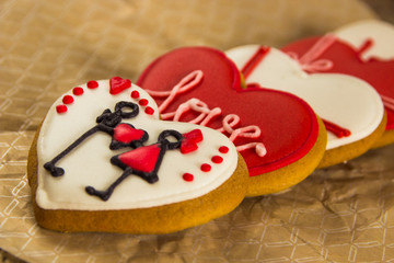 Obraz na płótnie Canvas Colored red and white heart cookies on Valentine's day