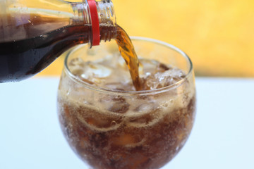 cola with ice in glass ready for drink to make you fresh