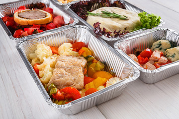 Healthy food take away, top view at wood background