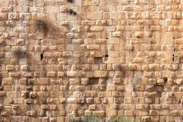 Tissu par mètre Pierres Background of stone wall in Old City Jerusalem, Israel.