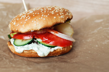 Homemade hamburger or cheeseburger with vegetables