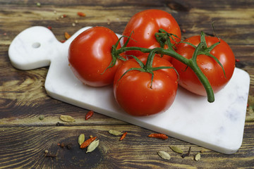 Raw Organic Red  Tomatoes on the Vine