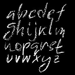 Handwritten vector chalked alphabet. Imitation texture of chalk. Modern hand drawn alphabet. Isolated letters.