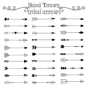 Hand drawn tribal arrows set. Vector illustration.