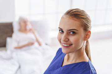 Outgoing physician situating in apartment of patient