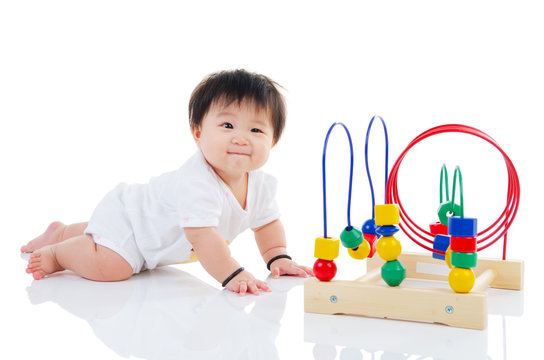 Asian baby playing toy
