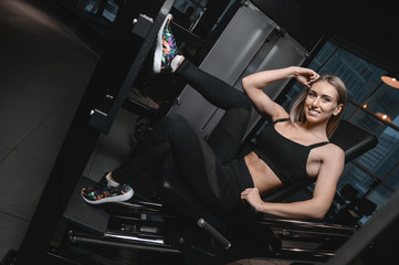 Fototapeta na wymiar young sexy fitness woman train and exercising in gym healthy