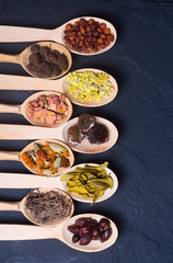 Herbs in wooden spoon