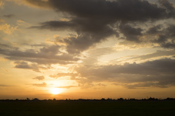 Fototapeta na wymiar sunset sky over clouds