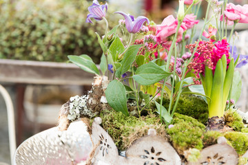 ESSEN, GERMANY - JANUARY 25, 2017: Lovely decorated flowers on a table target at buyers for a...