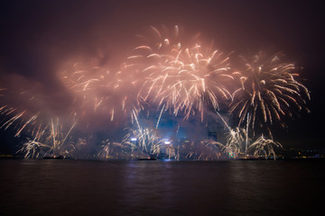 Fireworks show along Victoria harbor in Hong Kong, China.
