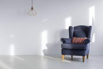 Interior with blue armchair