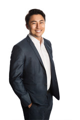 Handsome businessman wearing a blue suit and white shirt, standing with his hands in pocket. White background.