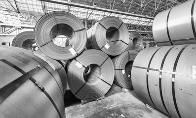 Metal coils stacked. Industrial environment