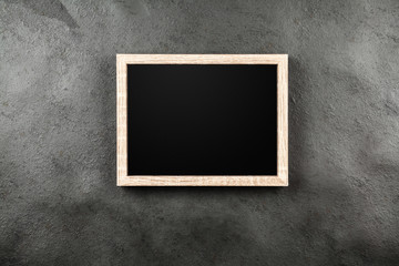 Picture frame on a grey wall