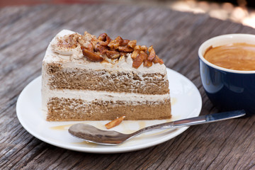 Coffee cake with almond and hot espresso