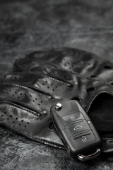 Car keys and driving gloves