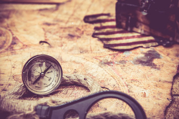 Columbus day and world map with compass