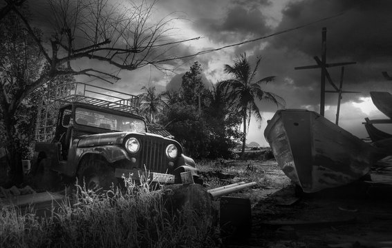 Photo with old car and old boat on tropical land,sky and vintage effect create dramatic atmosphere