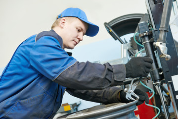 car wheel tyre fitting or replacement