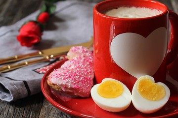 Heart shaped egg and Cooffe latte  / Breakfast for Valentine's day