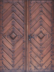Vintage wooden brown door close-up