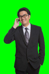 Young asian handsome businessman and glasses using smartphone